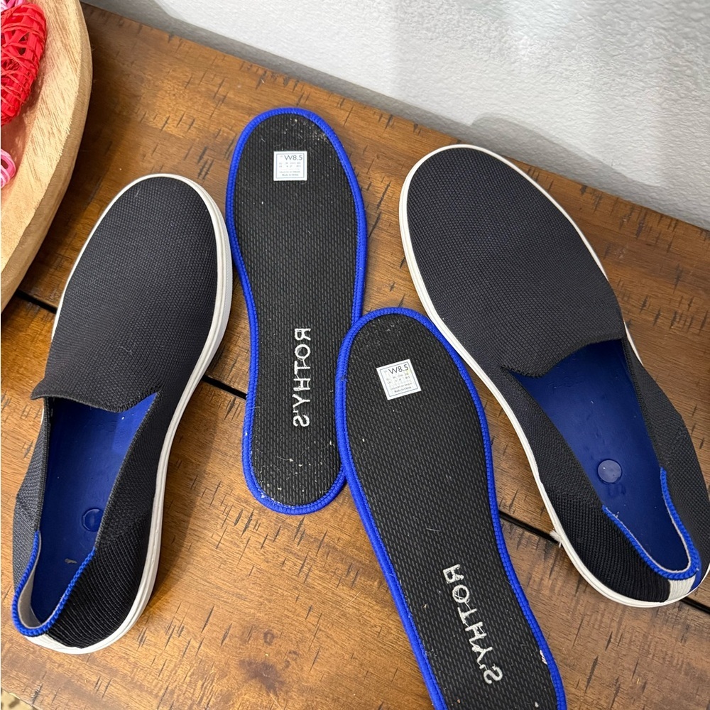 Rothy's The Original Slip On Sneaker in black solid with blue trim - Picture 6 of 8